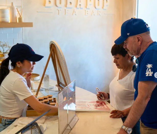 Guests ordering at the BobaPOP Tea Bar counter