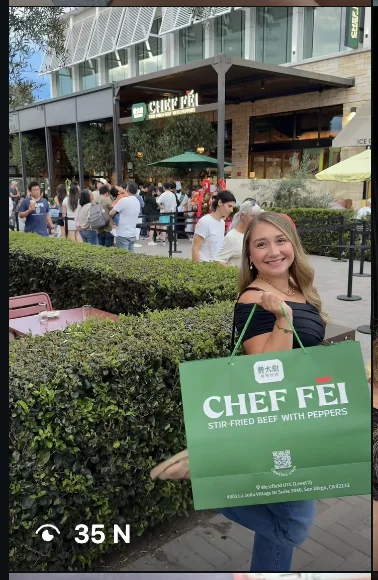 karlabracamontess with a Chef Fei bag outside the restaurant
